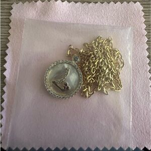 Letter “L” with heart jewelry. New